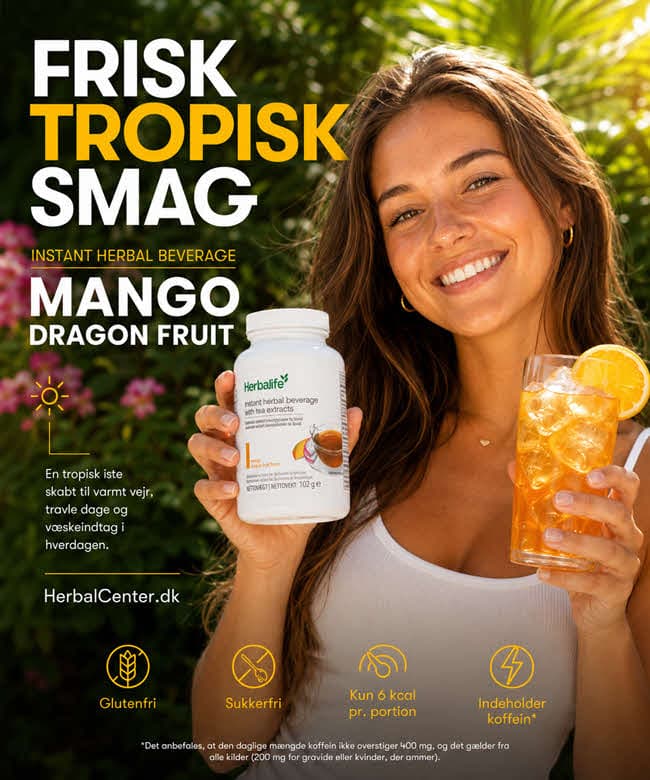 Mango Dragon Fruit Herbalife Drik - Solbrug kvinde i haven nyder en frisk kold drik